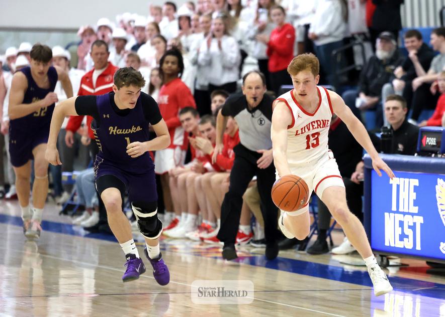 Greg Hoogeveen photo/LHSBBB1 Luverne senior Jaydon Johnson moves the ball up the court followed by a Montevideo player in the Section 3AA sub-section semifinal contest Tuesday, March 3, in Windom. Luverne lost 74-61 Thunderhawks in the game to end their season.