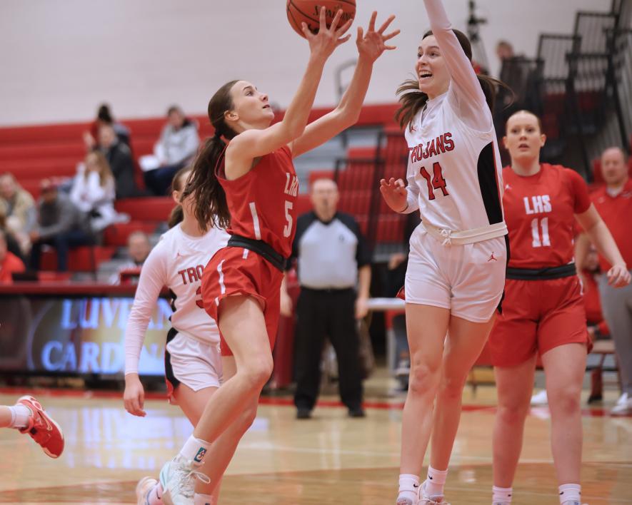 Cardinal seventh-grader Ingrid Schmuck works for a layup against Worthington at home. LHS beat the Trojans 52-46 Thursday, Feb. 13. Greg Hoogenveen/Rock County Star Herald Photo