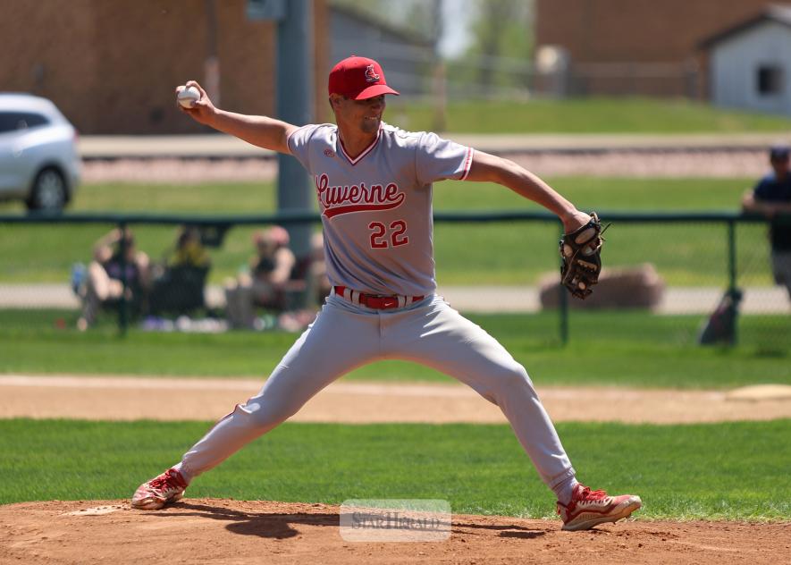 Redbird pitcher Jake Haugen throws the first pitch of the 2025 season to a Pipestone batter at Redbird Field Sunday, May 11. Luverne beat the A’s 11-1 in the game.