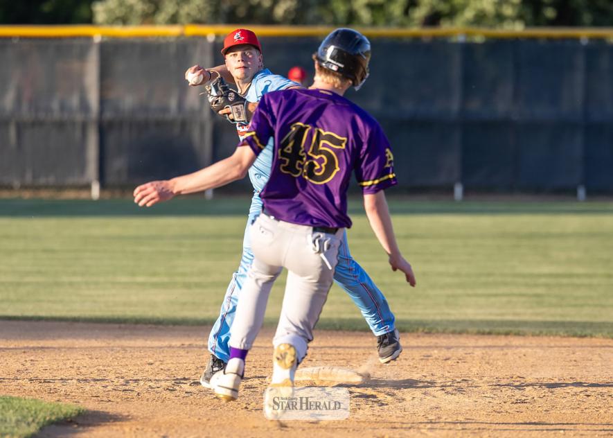 Greg Hoogeveen photo/0618 redbirds1 Luverne Redbirds Alex Schlosser touches second base and throws to first during his team’s 7-3 victory over Pipestone at Redbird Field June 10.