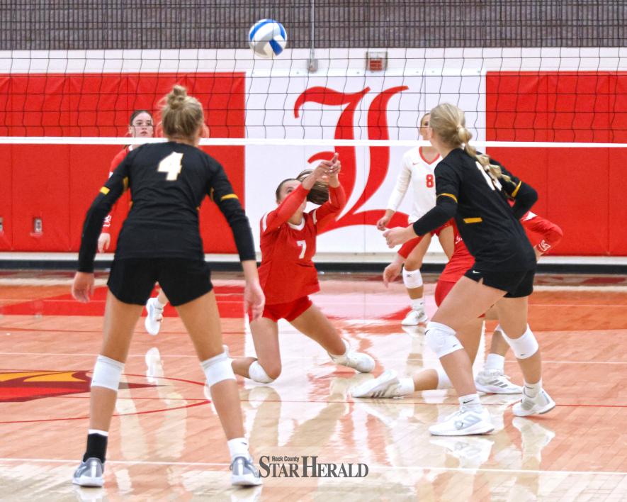 LHS senior Amira Cowell goes to her knees to return the ball back to SWMC Tuesday, Aug. 27, in Luverne. The Cardinals fell 3-0 to the Eagles in the game.