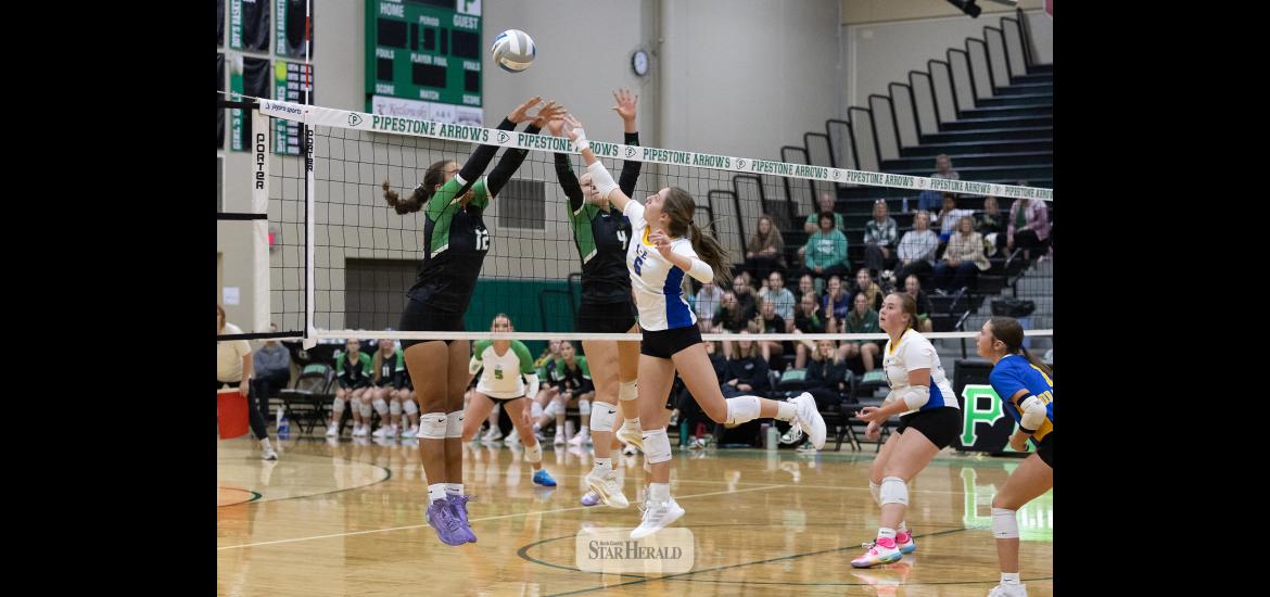 Greg Hoogeveen photo/0917A/EVB1 Adrian-Ellsworth junior Jordan Kruger, No. 6,  extends to hit the ball over the net against Pipestone Sept. 14 on the road. The Dragons beat the Arrows in three sets.