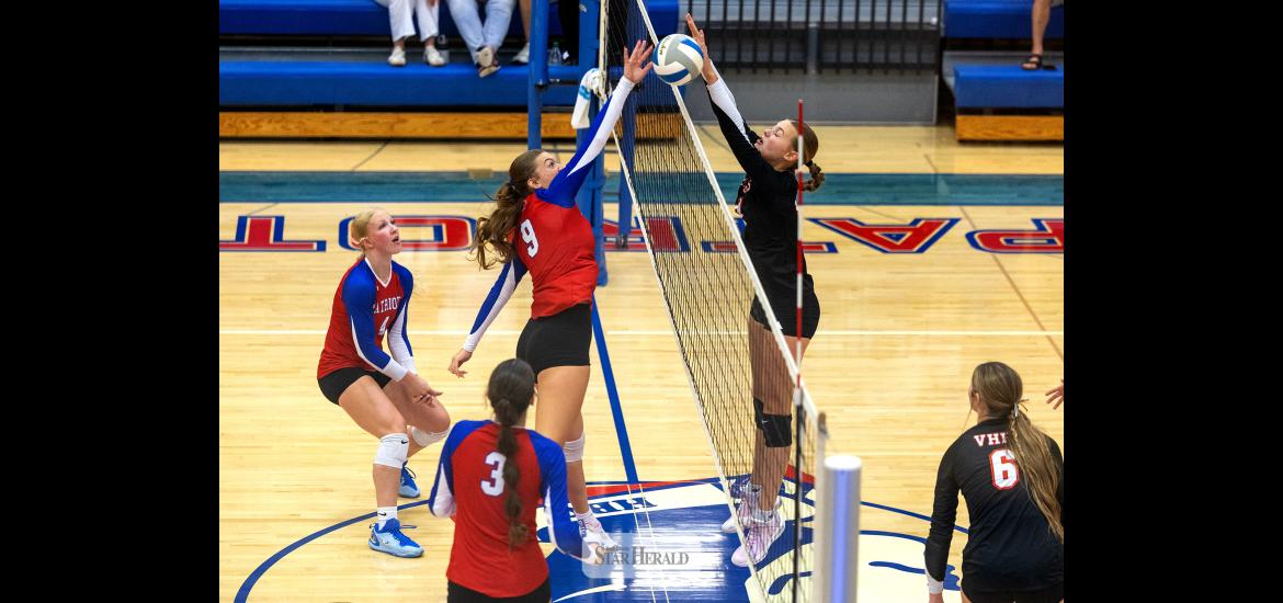Greg Hoogeveen photo/0917HBCVB1 Patriots senior Ava Steinhoff, No. 9, fights for a free ball over the net against Viborg-Hurley Sept. 10 at home. The Patriots beat the Cougars in three straight sets in their first home match.