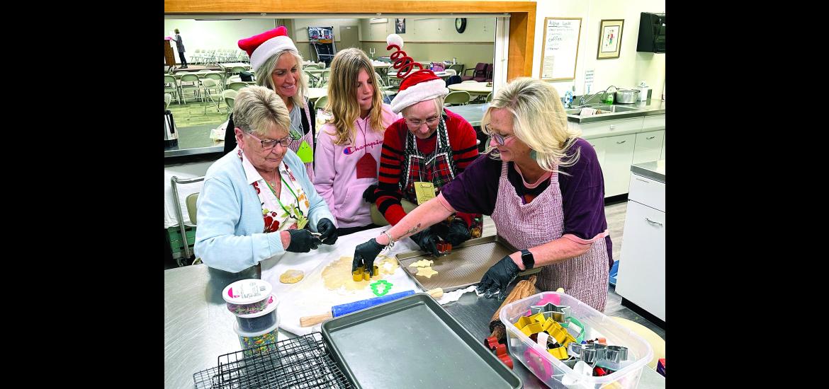 During the “Declutter Retreat” Saturday Jan Israelson, (from left) Brenda Wessels, Amara Antoine, Marlene Wassenaar and Staci Zwaan cut out cookies to prepare for decorating.Lori Sorenson/Rock County Star Herald Photo