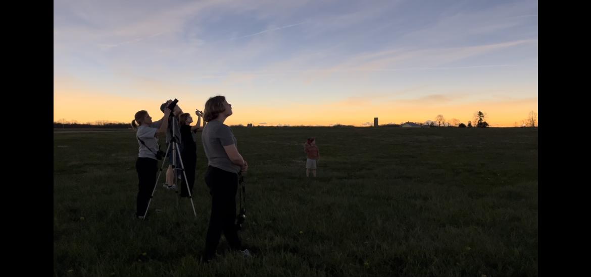 Jim and Heather Johnson, Luverne, and their family take in the moment of totality from their viewing point in Muncie, Indiana. Pictured are Heather Johnson with the camera, Luella Johnson in the foreground and Jim Johnson, Ashlyn Johnson and nephew Magnus Johnson in the background.