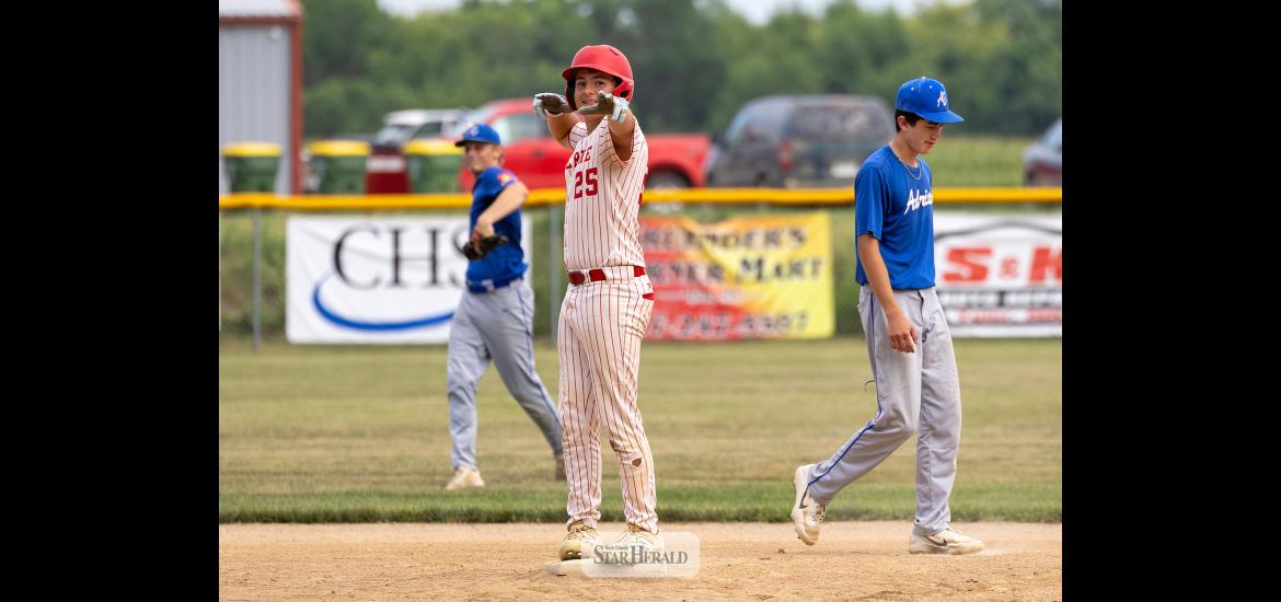 Greg Hoogeveen photo Luverne Junion Legion player Korbin Miles celebrates on second base after a double against Adrian Monday, July 20, in Ruthton. Luverne beat Adrian 6-1 to stay alive in the sub-state tournament elimination bracket.