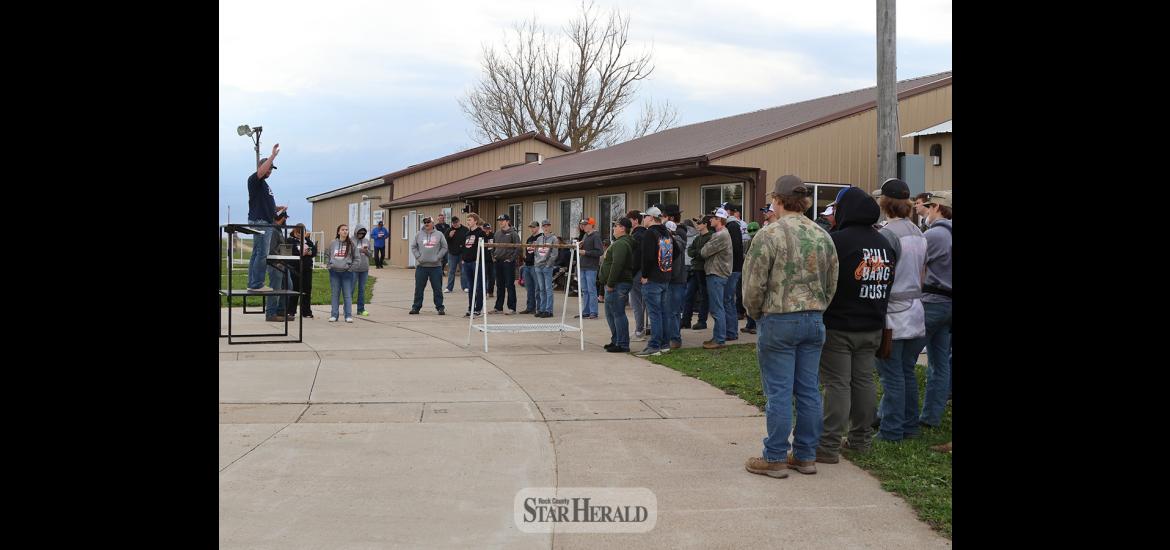 Teams listen to instructions at the Second Annual Border Battle Trap Meet in Garretson Friday, May 3. Eight area trap teams competed for bragging rights and socialized with other shooters they would never meet in the regular season.