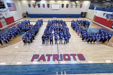 Dalton Bass shared this picture of Hills-Beaver Creek Secondary School students and staff posing Monday for a photo in honor of receiving the distinction as a National Blue Ribbon School.