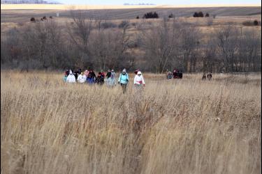 More than 50 people started their new year outdoors Wednesday, Jan. 1, at the Blue Mounds State Park for the Minnesota DNR’s “First Day Hike,” which occurred at state parks across Minnesota. The group completed a 1.2-mile hike along parts of the Upper Cliff Line and Lower Cliff Line trails. Lori Sorenson/Rock County Star Herald Photo