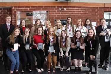 The Luverne High School Business Professionals of America chapter will send 22 students to compete at the Minnesota BPA Conference in March. Showing their hardware earned at the recent Region 8 Conference are (front, from left) Sarah Stegenga, Kylie Kindt, Abby Boltjes, Anna Banck, Julia Beyer, Elaine Nath, Paige Kubesh, (back) Jaydon Johnson, Nora Louwagie, Payton Behr, Kylie Vander Lugt, Ella Reisdorfer, Kiesli Smith, Kayla Bloemendaal, Maria Rops and Xavier McKenzie. Contributed Photo
