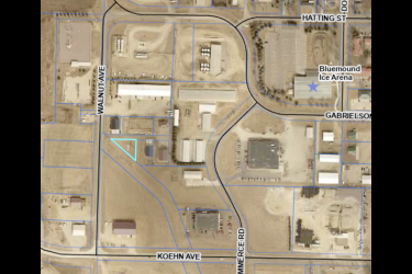 Phil and Louella Voigt purchased a small trianglar-shaped lot at 805 Walnut Service Drive for the purpose of constructing an L-shaped multi-use building for a workshop and storage rental space. This was the final remaining lot to be sold in this subdivision where smaller, shop-type buildings are allowed.