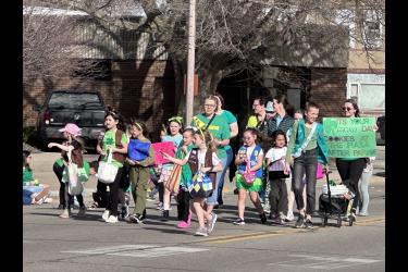 The local Girl Scouts make their way through the parade.