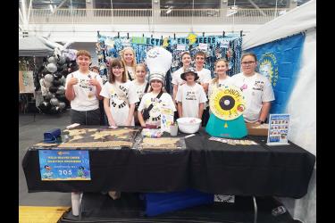 Hills-Beaver Creek robotics team (from left) Ryker Gehrke, Lily Fick, Penni Moore, Eva Hubbard, Arya Tollefson, Bentley Cleveland, Noah Engelkes, Ian Lingen, Elaina Bos and Nora Tatge pose at the team’s “pit” during the WPI Annual First LEGO League event June 13-15 in Worchester, Massachusetts. Shared image