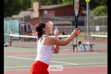 Greg Hoogeveen photo/0917LHStennis1 Luverne junior Autumn de Cesare returns a serve against her Fairmont opponent Sept. 8 at home. Fairmont beat LHS 7-0.