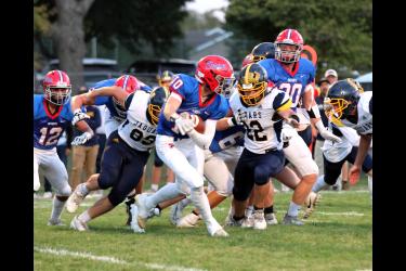 Senior Justin Roelfs carries the ball against Renville Friday, Sept. 29, in Hills. Roelfs rushed for 23 yards in the Patriots’ 45-14 win. H-BC is now 5-0.
