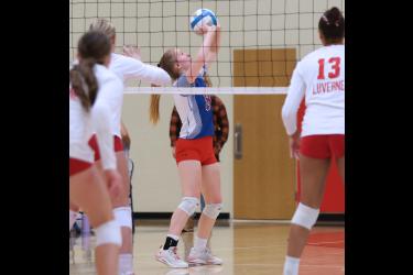 H-BC junior Bailey Spykerboer sets the ball for the Patriots Tuesday, Oct. 17, in Hills against Luverne. LHS beat H-BC 3-0 in the final season match.