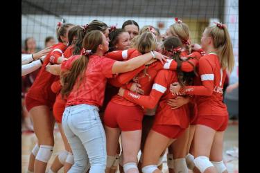 The Luverne Cardinals volleyball team reacts to their 3-1 match win over Fairmont in Luverne Friday, Oct. 27. LHS was scheduled to go on the road to take on Redwood Valley Tuesday, Oct. 31, in Section 3AA quarterfinal action.