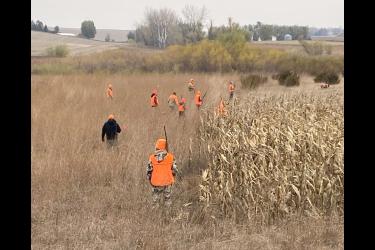 A group of youth hunters and adult mentors hunt and walk on private conservation ground owned by Brad and Rodney Lowe in western Rock County.