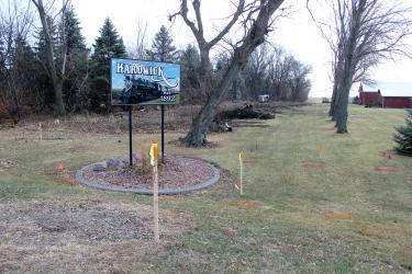 A new street appears Monday as the city of Hardwick begins a project that adds about nine acres to the city limits. Chad VerSteeg Excavating of Luverne began work Friday to remove the overgrown trees and vegetation on construction of a street in the new Scott Addition. The street will lead to the future home of the Hardwick Fire Department and to the 7.53 acres purchased by Steve and Yvette VanDerBrink for commercial and residential development. Mavis Fodness/Rock County Star Herald Photo