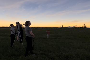 Jim and Heather Johnson, Luverne, and their family take in the moment of totality from their viewing point in Muncie, Indiana. Pictured are Heather Johnson with the camera, Luella Johnson in the foreground and Jim Johnson, Ashlyn Johnson and nephew Magnus Johnson in the background.