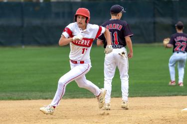 Greg Hoogeveen photo/JrLegion  Nolan Sneller rounds second base against Worthington June 25 in Junior Legion Red action.