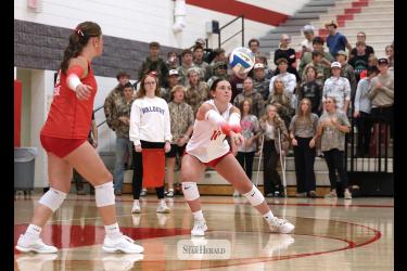 Greg Hoogeveen photo/LHSVB1 Luverne senior Macie Edstrom bumps a serve to her teammates against St. James Tuesday, Sept. 22, at home. The Cardinals beat the Saints 3-1 in Set 4 match.