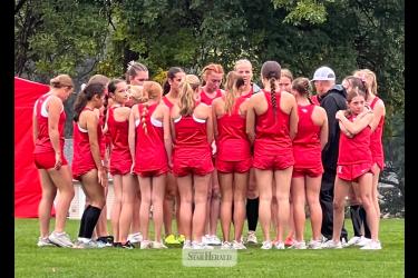 The Luverne cross country team groups before the girls’ varsity race Thursday, Sept. 22, in Jackson.