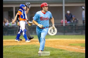 Redbirds Casey Sehr watches as his hit falls to the ground in center field against Sioux City Friday, July 24. The Redbirds fell 14-0 to the Squirrels in exhibition play at Redbird Field. Greg Hoogeveen photo/Redbirds1