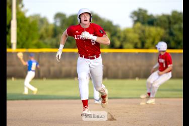 Greg Hoogeveen photo/SL1 Maddox Miller heads for third base with Landyn Lais rounding second base against Windom Monday, July 6, in Luverne. The Luverne Senior Legion baseball team handily beat Windom 10-4 in the contest.