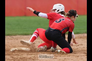 Junior Payton Behr steals second base safely against Redwood Thursday, May 2, in Luverne. LHS beat Redwood 12-2 and 13-3 in the doubleheader.