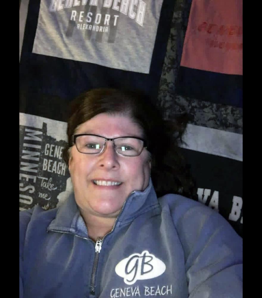 Faye Bremer (pictured below, laying the quilt she received as a Christmas gift in 2016) is missing the quilt (above) that family members are asking the public to help find. 